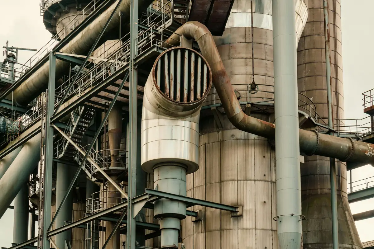Industrial plant with large pipes, ducts and tanks